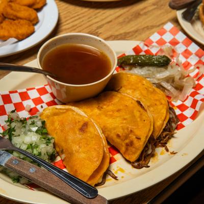 Quesabirria Tacos plate.