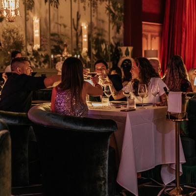 Guests toasting and enjoying the ambiance during diner service.