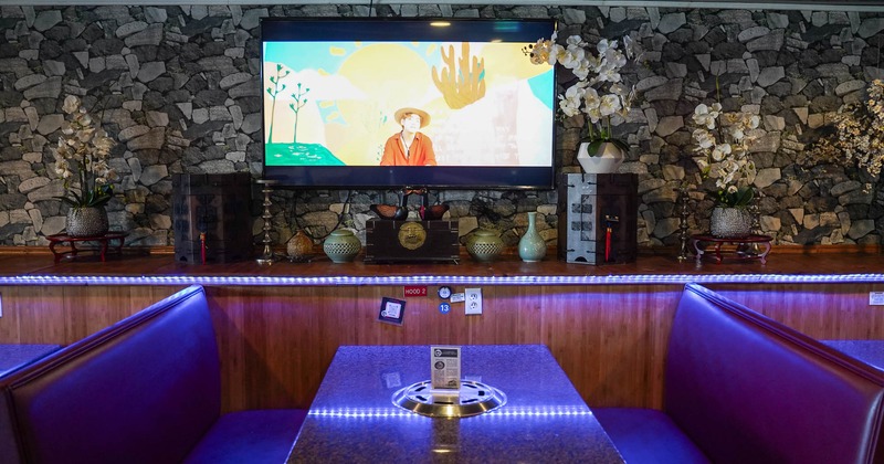 Interior, restaurant booth with TV above