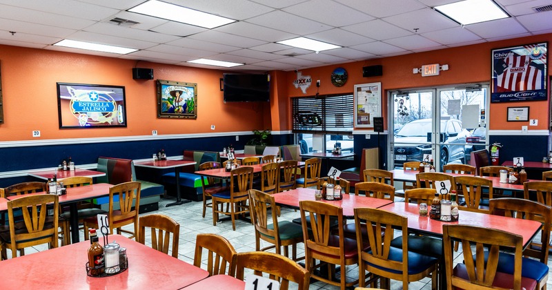 Dining area of a restaurant with colorful walls