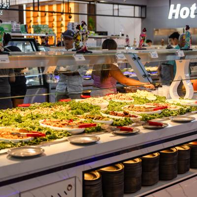 Interior with self-service salad and cold food buffet display counter.