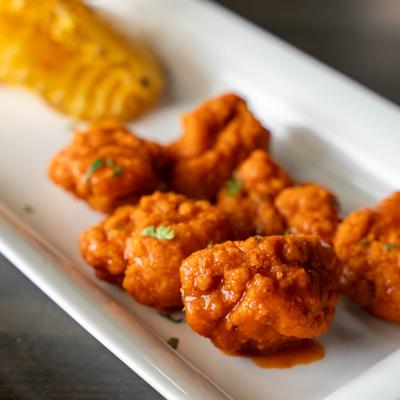 Boneless spicy chicken wings.