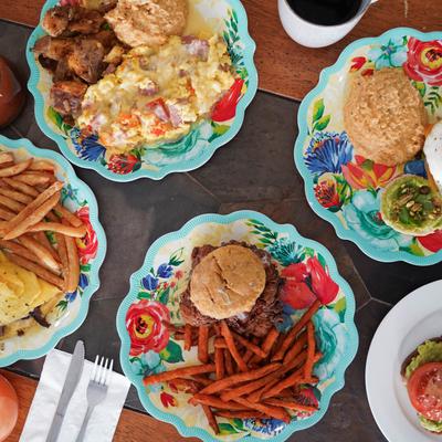 Various dishes and a coffee on a table.