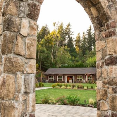 Decorative ark in the restaurant yard with restaurant in the back