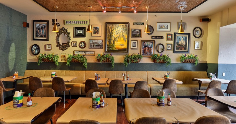 Interior, tables and chairs, bench seating by the wall