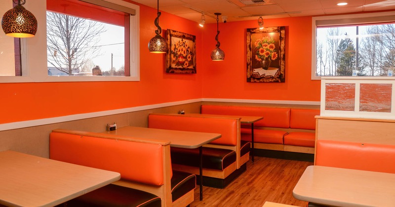 Inside, booths, paintings on the wall