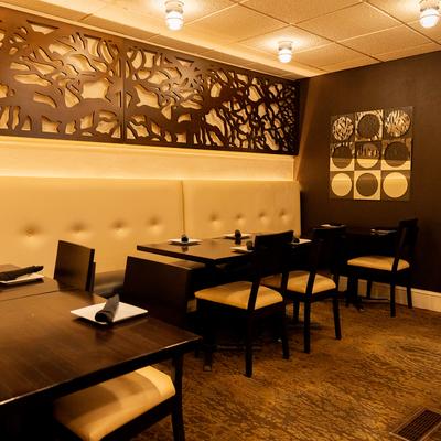 Nicely done interior dining area with set tables.