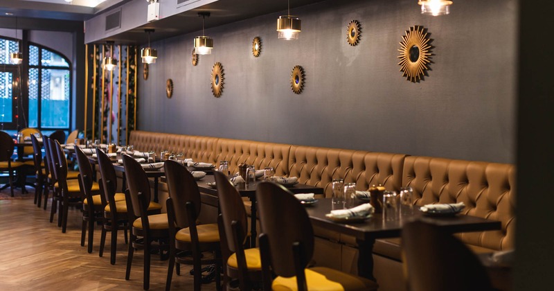 Interior, banquette seating with tables and chairs