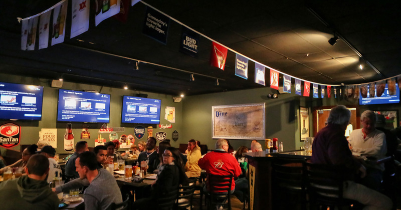 Guests enjoying food and drinks
