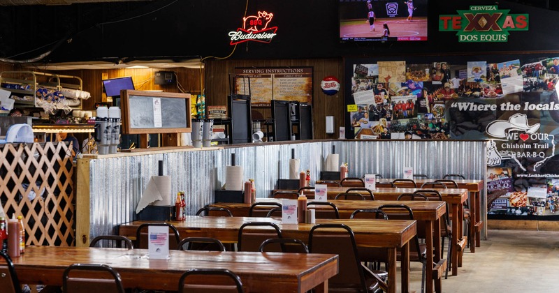 Interior, seating area with chairs and tables ready for guests