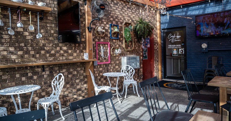 Tables and chairs with decoration on the wall