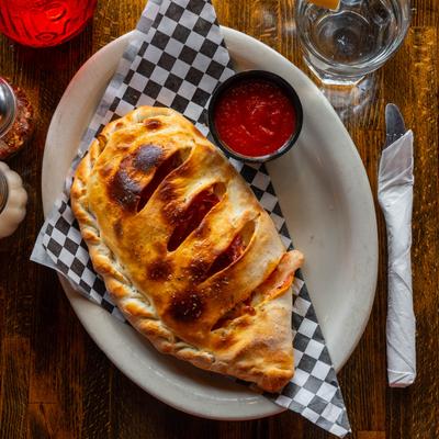 Herbivore calzone served with marinara.