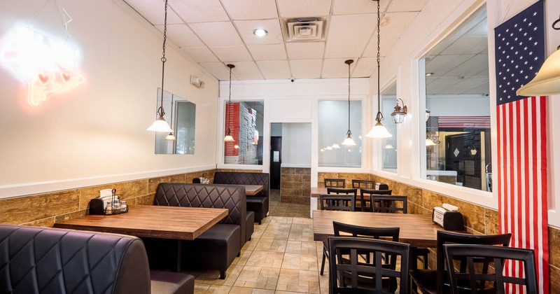 Interior, restaurant booths, tables and chairs in dining area