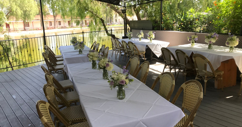 Exterior, table ready for the guests by the lake