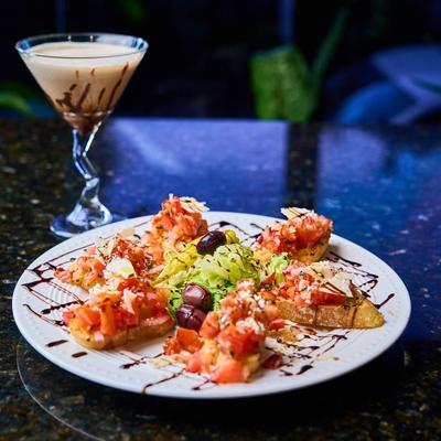 Bruschetta a La Pomodoro and Tiramisu martini.