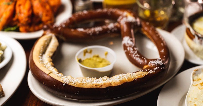 Giant pretzel with mustard dip