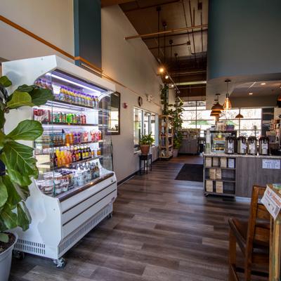 A refrigerated case with various drinks.