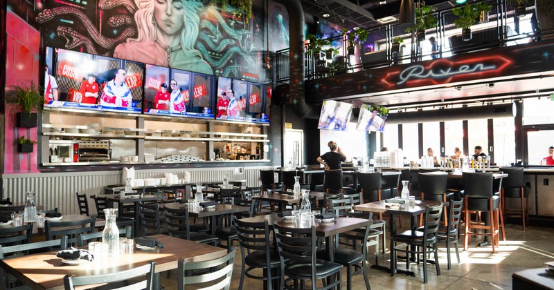 Interior, tables and chairs in dining area