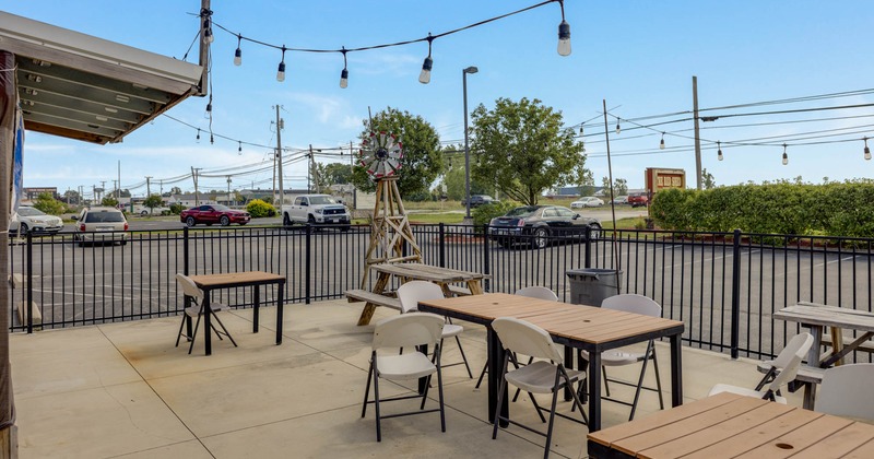 Patio, dining tables, chairs, lights