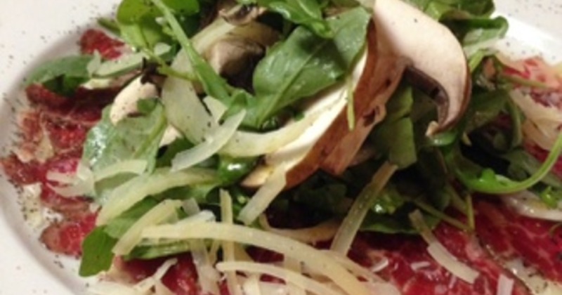 Meat and arugula dish