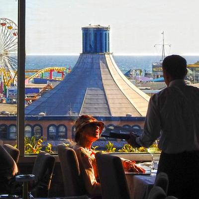 Afternoon dining crowd with an amazing view of the Santa Monica Pier.