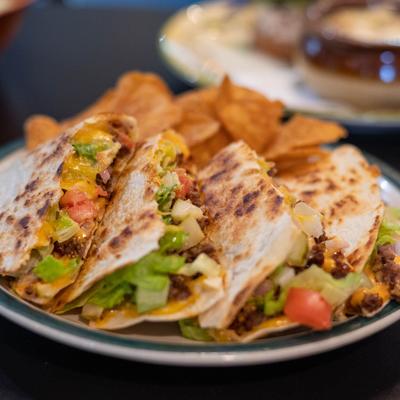 Veggie quesadilla served with homemade chips.