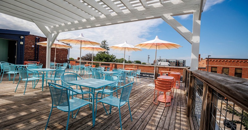 Outside, partly covered seating area, parasols