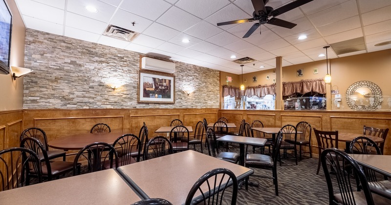 Interior, dining area with fan on the ceiling