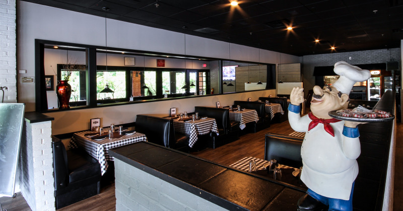Miniature figure of Italian chef on counter