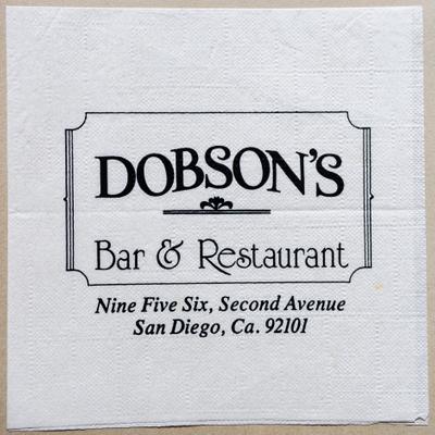 A paper napkin with Dobson's bar and Restaurant logo and address