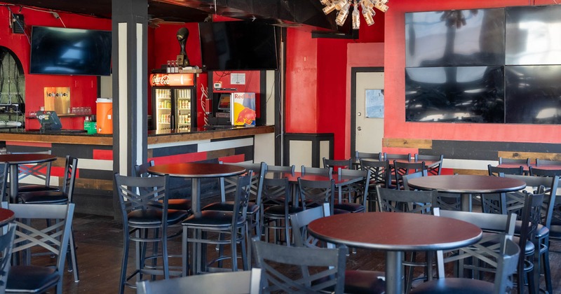 Interior, round tables in dining area