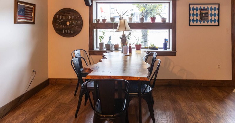 Wooden table by the window