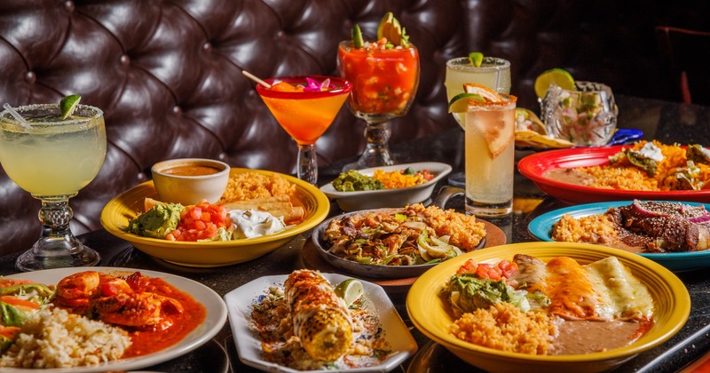 Assorted dishes and cocktail drinks