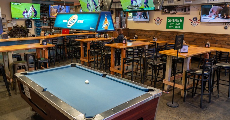 Interior, high tables and chairs, pool table area