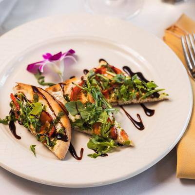 Tuscan flatbread on a white plate.