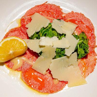 Beef carpaccio with arugula and shaved parmesan.
