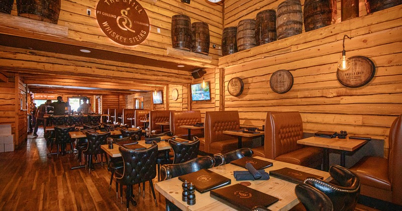 Interior, lined up dining tables and seats, restaurant booths