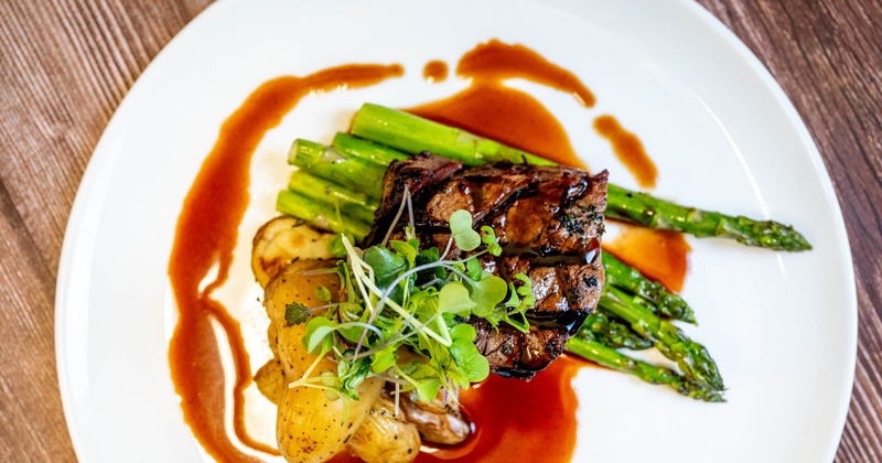 Beef Tenderloin served with potatoes and asparagus
