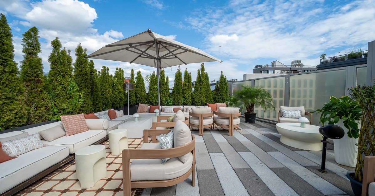 Modern rooftop lounge and outdoor seating area perfect for relaxation and social gatherings