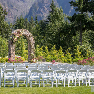 Wedding arch with chairs for the guests