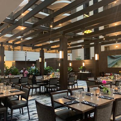 Dining room with set tables ready to receive guests