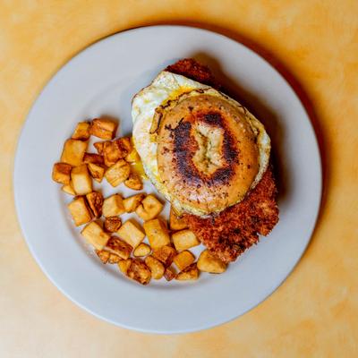 Frenched Wich sandwich with home fries, top view.