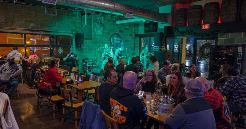 Interior, seating area, guests chatting and enjoying their drinks