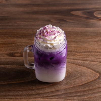 Ube Latte in a mason jar.