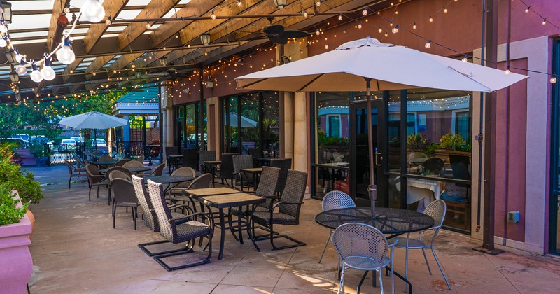 Exterior, patio, tables, chairs, parasols