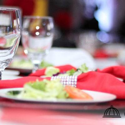 Salad, napkins, and glasses.