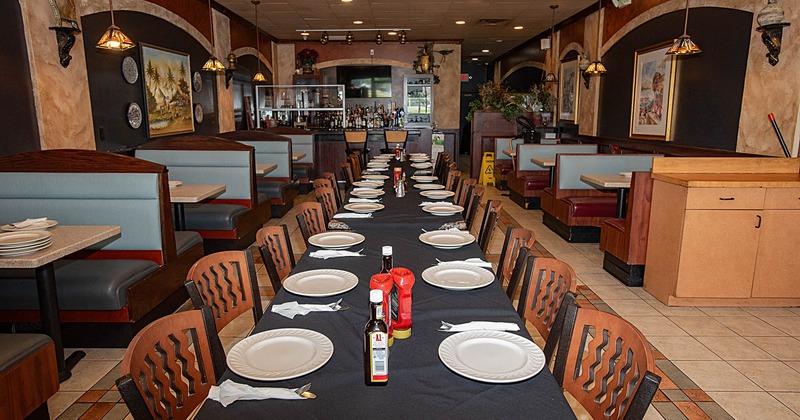 Interior, lined up tables with tableware