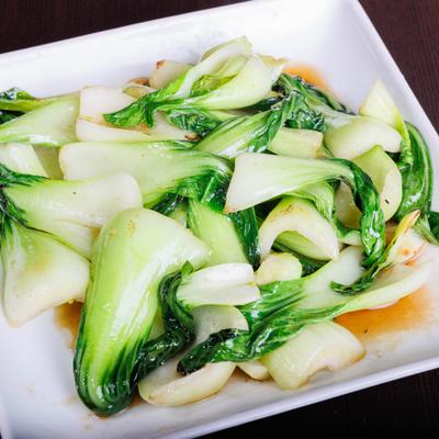 Stir-fried bok choy in a light sauce.