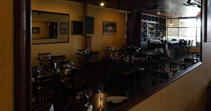 Interior, tables set for guests