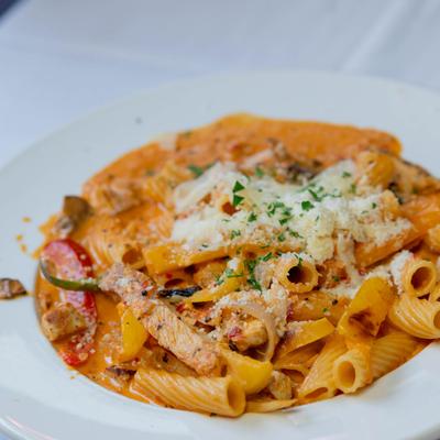 Rigatoni pasta with grilled chicken and creamy vodka sauce.